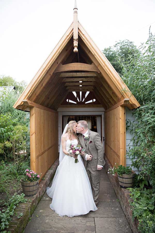 Newly married couple outside the ceremony room at The Reid Rooms Newly married couple outside the ceremony room at The Reid Rooms